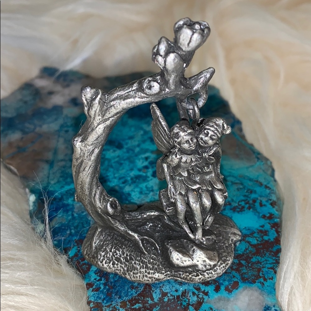 Pewter fairy and elf on swing